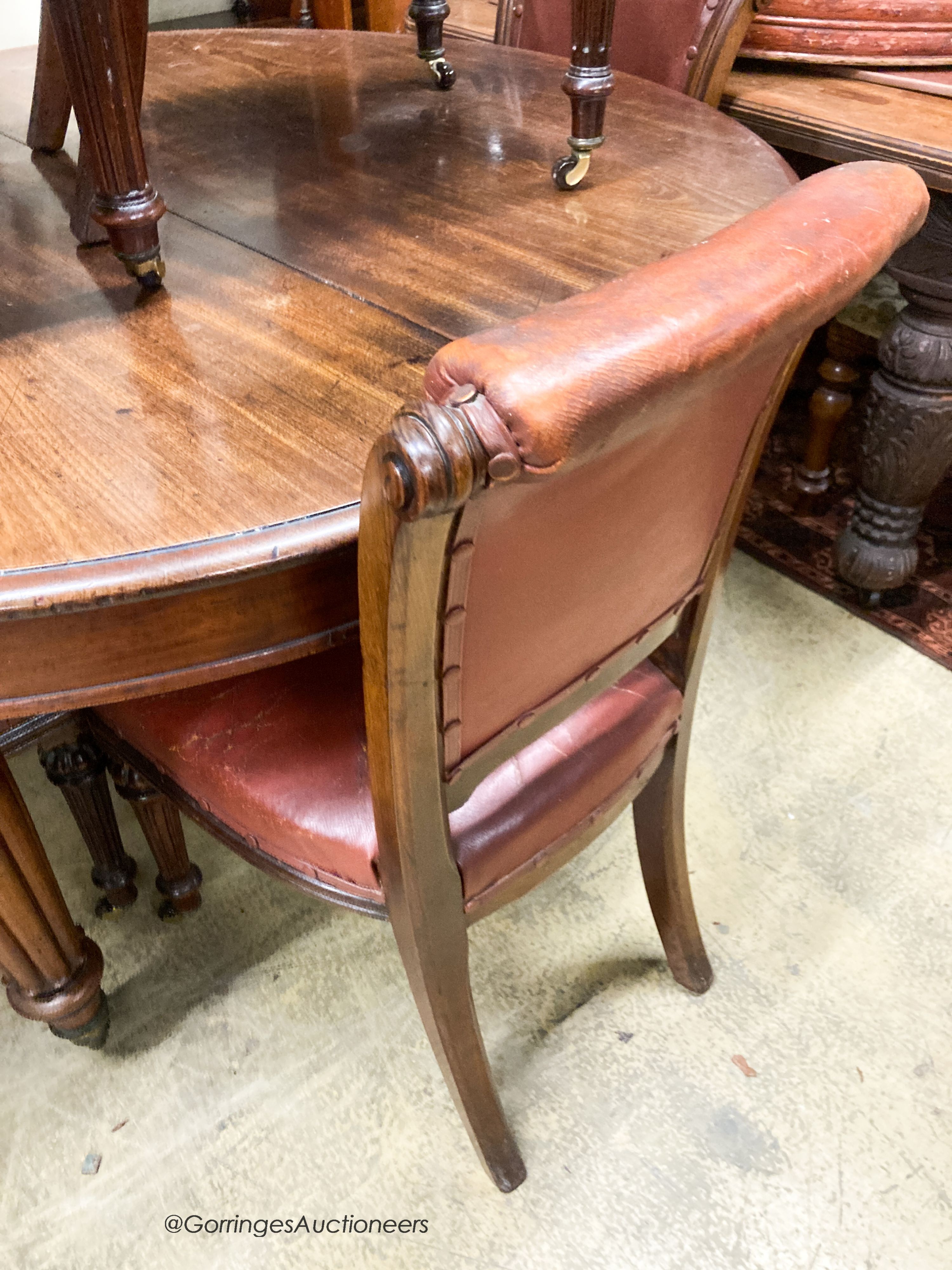 A set of six Victorian leather and mahogany dining chairs